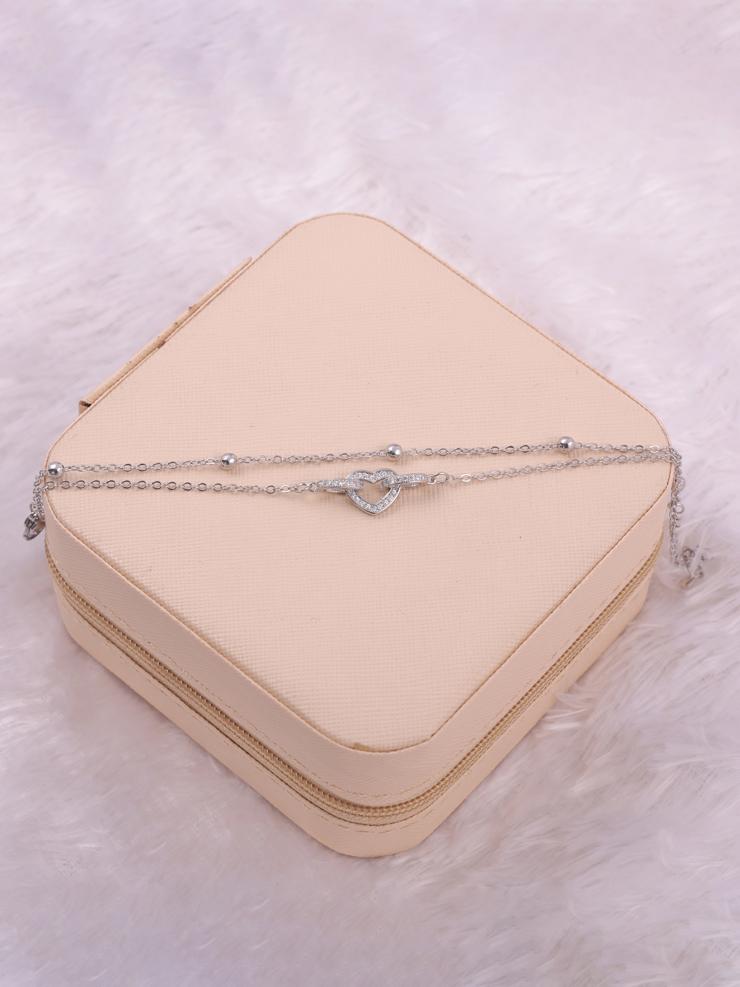 Elegant Interlocked Heart Anti-Tarnish Bracelet with Crystal Detailing
