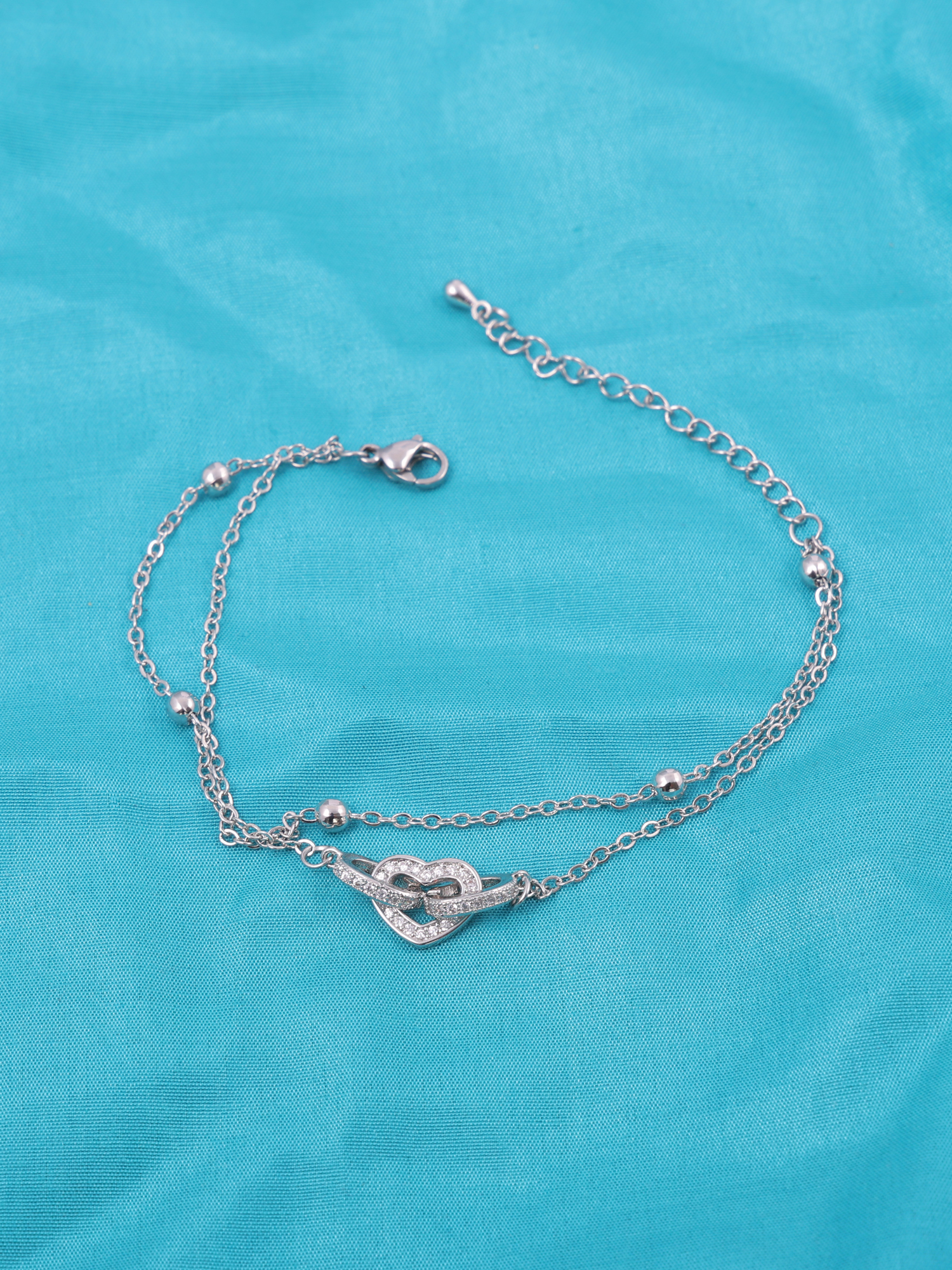 Elegant Interlocked Heart Anti-Tarnish Bracelet with Crystal Detailing