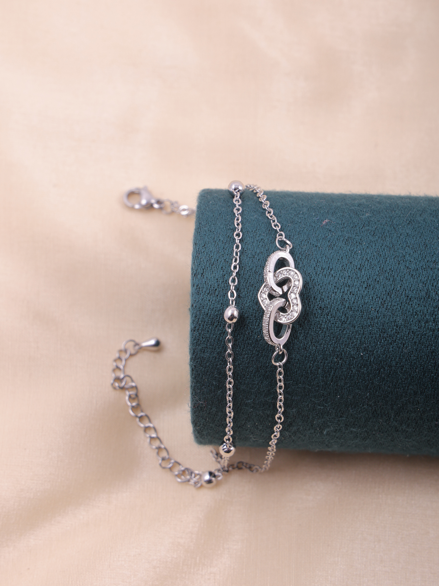 Elegant Interlocked Heart Anti-Tarnish Bracelet with Crystal Detailing